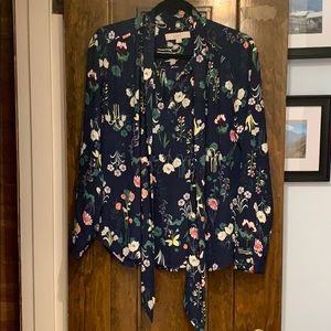 Navy floral print blouse with tie neck